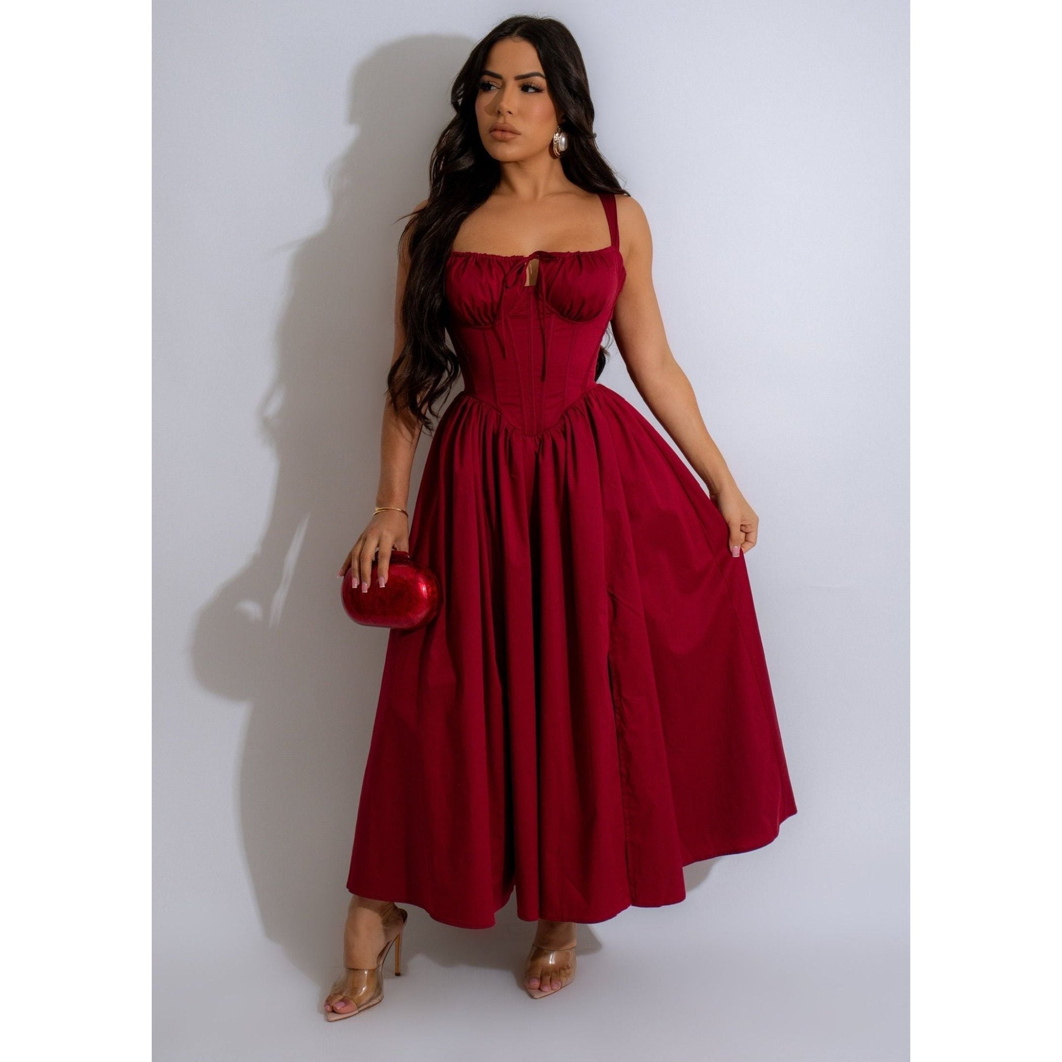 Red Flare Ankle Length Maxi dress with adjustable bow at the chest and the cinched waistline of the corset bodice style. Adjustable straps for comfort