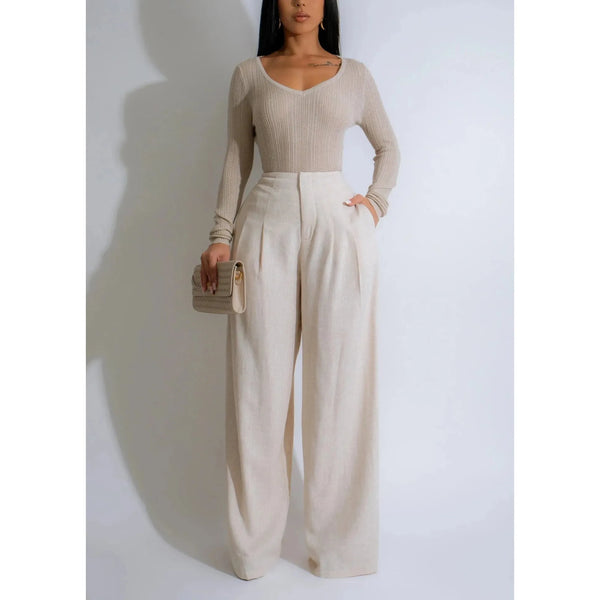 Long sleeve v neck ribbed top with matching  Linen pants with a front clasp and zipper closure and rear elastic waistband 